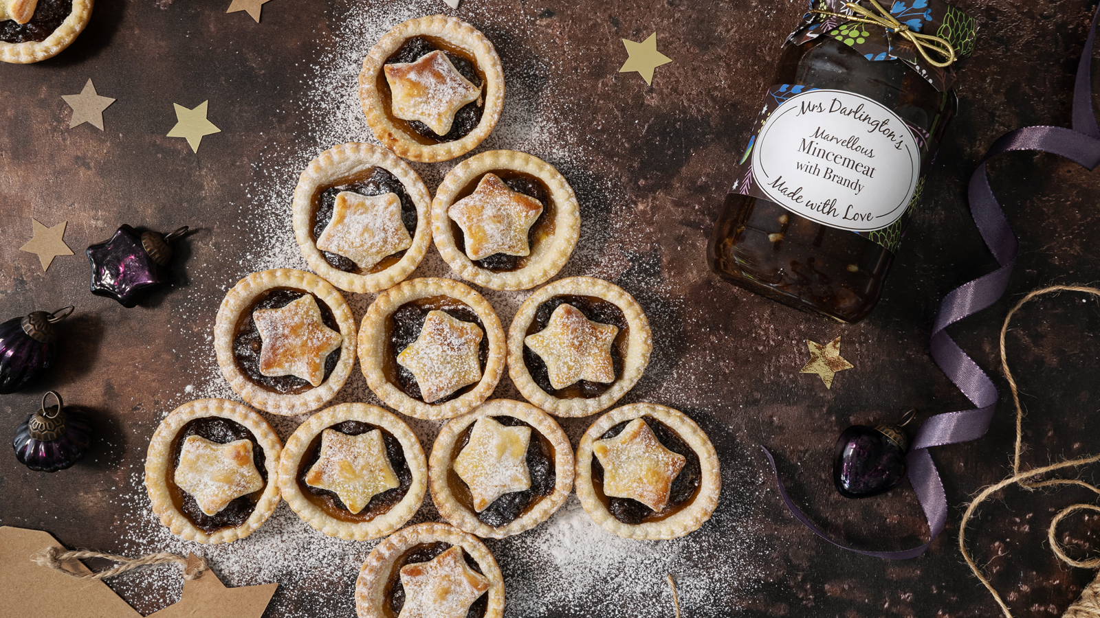 mince pies styled in the shape of a christmas tree
